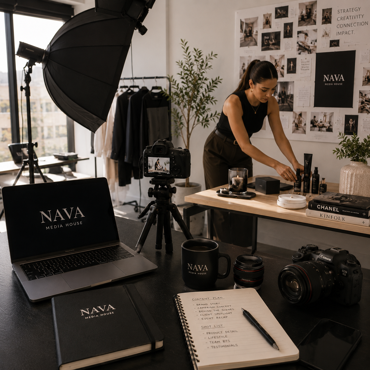 A NAVA Media House content shoot set up in a daylit studio, with a camera on a tripod, a content plan and product styling in progress